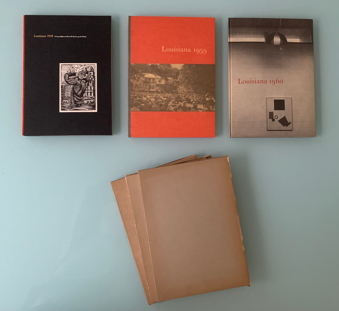 A collection of six books about Louisiana Museum of Art